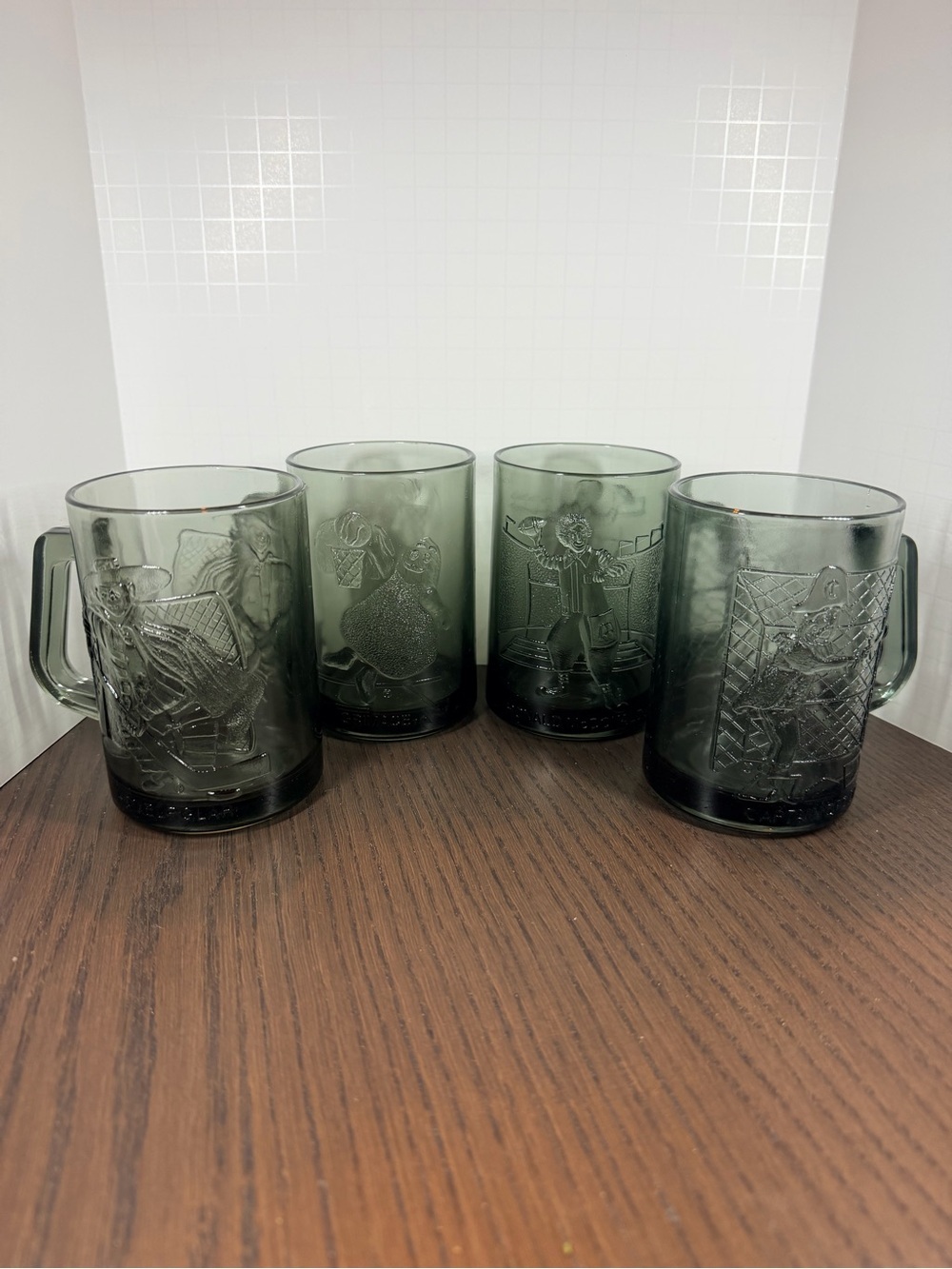 Set of 4 McDonald’s 1970’s Smoky Glass Embossed Mascot Sports Mugs